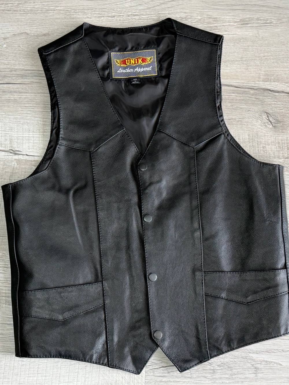Unik Black Leather Motorcycle Vest with Snap Front Premium quality.